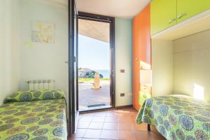Postel nebo postele na pokoji v ubytování Maison Deriu - Close to the Beach Sleeps 4 P3289