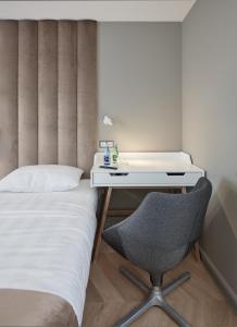 Łóżko lub łóżka w pokoju w obiekcie Hotel Maria