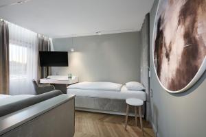 Łóżko lub łóżka w pokoju w obiekcie Hotel Maria