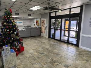 a christmas tree in a room with a store at Ocean Resort in Virginia Beach