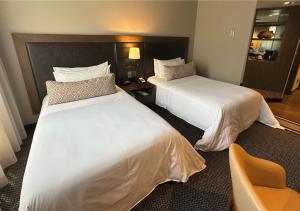 Ένα ή περισσότερα κρεβάτια σε δωμάτιο στο Movich Hotel Las Lomas