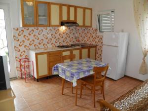 Kuchyňa alebo kuchynka v ubytovaní Apartment Gabriela 2