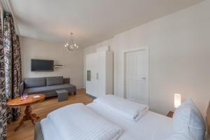 Rúm í herbergi á Altstadthotel Wolf-Dietrich