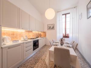 A kitchen or kitchenette at Affittacamere Firenze in Libertà Parterre