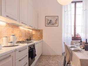A kitchen or kitchenette at Affittacamere Firenze in Libertà Parterre