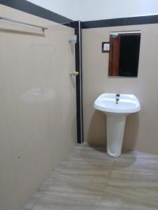 Koupelna v ubytování Kalum home