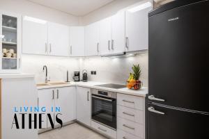 Küche/Küchenzeile in der Unterkunft Athenian Exclusive residence 4&2 ppl