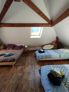 Posteľ alebo postele v izbe v ubytovaní Chambre d'Hôtes - Eco Gîte la Grange