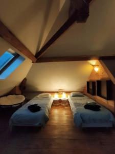 Postel nebo postele na pokoji v ubytování Chambre d'Hôtes - Eco Gîte la Grange