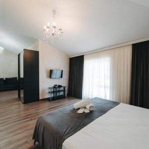 Postel nebo postele na pokoji v ubytování Avrasya Inn Hotel