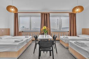 Postel nebo postele na pokoji v ubytování Abitohotel