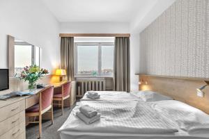 Postel nebo postele na pokoji v ubytování Abitohotel