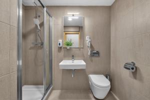 Koupelna v ubytování Abitohotel