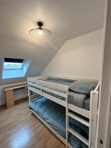Postel nebo postele na pokoji v ubytování Appart T3 confort 4-6 pers - CLIM-Hypercentre
