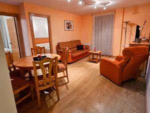 Posezení v ubytování Apartamentos Canfranc Pueblo 3000