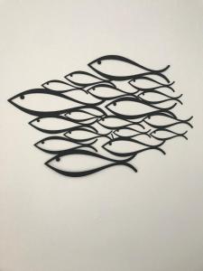 a piece of black metal on a white surface at Studio spacieux bord de mer in Camiers
