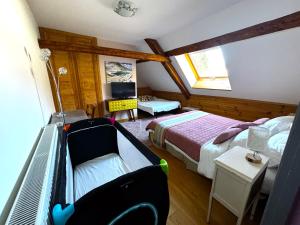 Postel nebo postele na pokoji v ubytování Chambre d'Hôtes La Grange des Ecrins