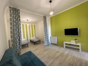 Телевизор и/или развлекательный центр в Casa Vacanze Merletto