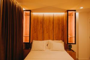Postel nebo postele na pokoji v ubytování Hotel Delicia + 11 fotografií