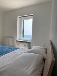 Кровать или кровати в номере Casa Vacanze Merletto