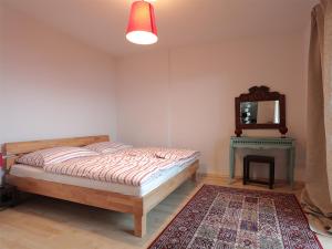 Tempat tidur dalam kamar di Appartement Györi.