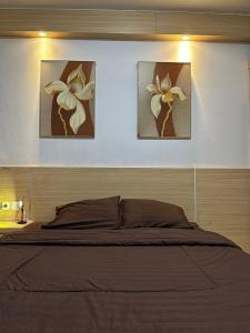 Ένα ή περισσότερα κρεβάτια σε δωμάτιο στο UVroomOfficial Apartment Riverview Tower Mahakam +18 φωτογραφίες