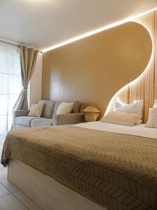 Letto o letti in una camera di Kay Pampa
