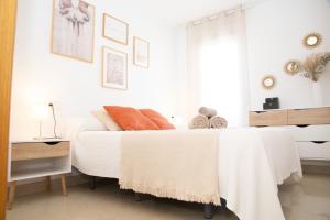 Łóżko lub łóżka w pokoju w obiekcie Summer Beach House
