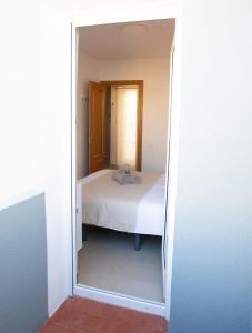 Łóżko lub łóżka w pokoju w obiekcie Summer Beach House