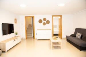 Telewizja i/lub zestaw kina domowego w obiekcie Summer Beach House