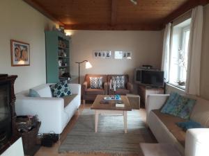 Posezení v ubytování Vakantiehuis Reuzengebergte