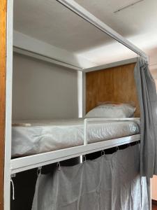 En eller flere senge i et værelse på Best Stay 394 homestay