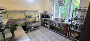 Kuchyň nebo kuchyňský kout v ubytování Hotel Sherwi Hyul