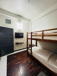 Ένα ή περισσότερα κρεβάτια σε δωμάτιο στο Vientiane Star Hotel B