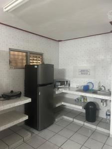 Kuchyň nebo kuchyňský kout v ubytování Hostel Treebu