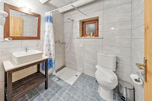 Kúpeľňa v ubytovaní Villa Poseidon Residence