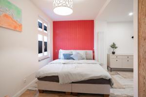 Ένα ή περισσότερα κρεβάτια σε δωμάτιο στο Gustava 30