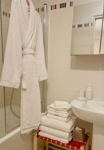 Un baño de Appartement Swan House Paris Champs Elysée