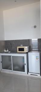 Kuchyň nebo kuchyňský kout v ubytování Santos Medina