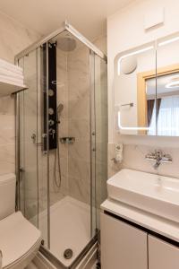 Koupelna v ubytování Deluxe Appart & Hotel Zürich Kreis 4