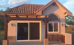 a model of a house with a large sliding door at Tiny Home Villa - T8 in San Diego