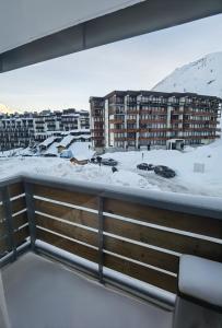 a view from the balcony of a building in the snow at MyHome - PSO37 - Studio cosy 4 pax Val Claret in Tignes