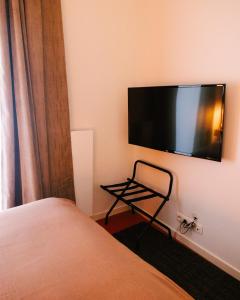 TV a/nebo společenská místnost v ubytování A Place Antwerp - Boutique Suites & Flats - Leeuwenstraat 20
