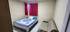 Ένα ή περισσότερα κρεβάτια σε δωμάτιο στο Casa Lory