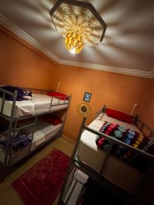 Postel nebo postele na pokoji v ubytování Riad dar Malak