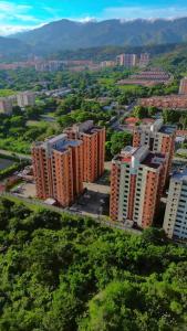 an aerial view of a city with tall buildings at Alojamiento en Valencia in Naguanagua
