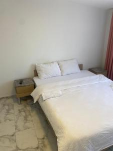 Postel nebo postele na pokoji v ubytování HOTEL YEDİkapı