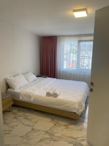 Postel nebo postele na pokoji v ubytování HOTEL YEDİkapı