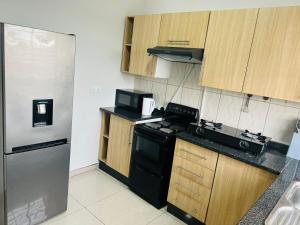 Afbeelding uit fotogalerij van Kwilanzi Apartments in Lusaka