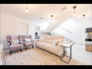 Χώρος καθιστικού στο Villa Olivia